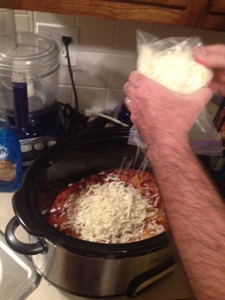 Hubby Stirring in the Cheese at ASlobComesClean.com