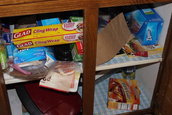 A Messy Kitchen Cabinet at ASlobComesClean.com