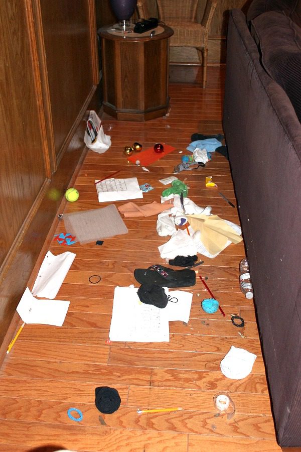 work through overwhelming mess behind the couch at ASlobcomesClean.com