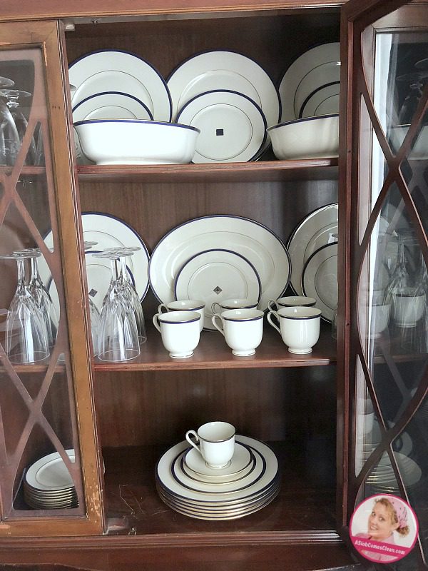 china cabinet dishes make space declutter organize at ASlobComesClean.com